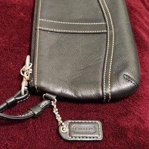 Black leather trim wristlet